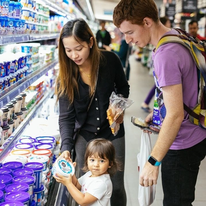 Village Grocer shoppers selecting groceries